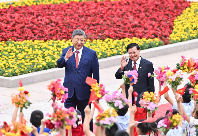 习近平同老挝人民革命党中央总书记、国家主席通伦举行会谈5.png